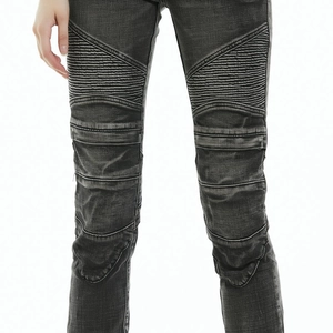 Detail of vintage motorcycle jeans featuring reinforced knee accordion panels in dark grey