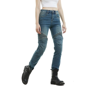 Detail of blue motorcycle jeans with accordion stretch panels on knees for riding