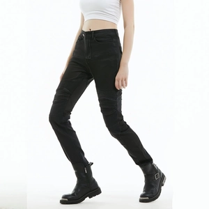 Detail of black motorcycle jeans for women showing knee pleats and slim fit mesh fabric