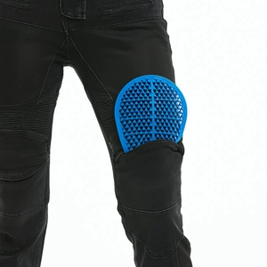Detail of blue honeycomb protective knee pads inserted in mesh motorcycle jeans