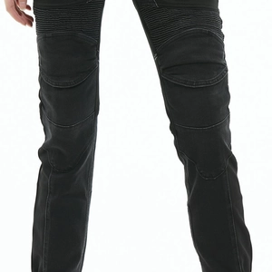 Detail of women's motorcycle jeans with elastic accordion panels and knee armor pockets