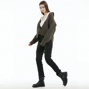 Full side view of women motorcycle riding pants with olive jacket and biker boots