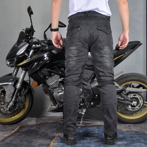 Vue arrière du jean moto gris avec zones extensibles et poches arrière à rabat