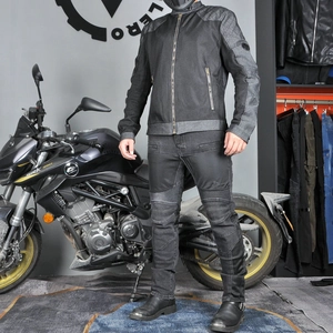 Detail of black breathable mesh motorcycle riding jacket and protective pants set