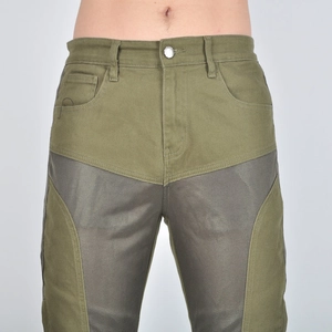 Close-up of olive green mesh breathable motorcycle riding pants with protective fabric