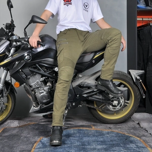 Detail of army green motorcycle cargo pants with stretch knee panels for riding
