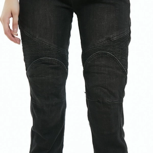 Detail of reinforced accordion stretch panels on knees of black motorcycle denim jeans