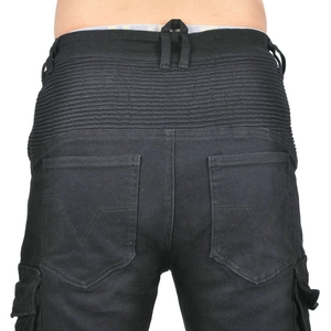 Detail of black motorcycle jeans featuring elastic waist pleats and V-stitch pockets