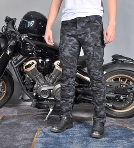 Detail of men's camouflage motorcycle jeans with elastic knee pleats and side cargo pockets