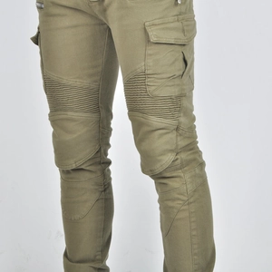 Close-up of olive green motorcycle riding pants with reinforced knee accordion panels