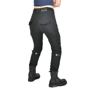 Detail view of black motorcycle riding pants featuring adjustable straps and knee protectors
