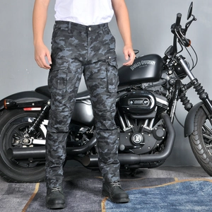 Detail of cargo pockets and knee stitching on camouflage motorcycle riding pants