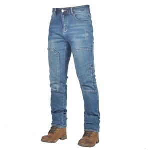Detail of motorcycle jeans with reinforced knee patches and subtle washed indigo finish