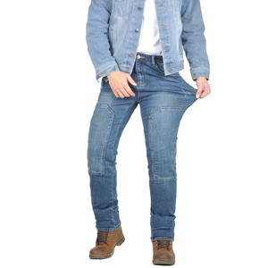 Detailed close-up of motorcycle denim jeans featuring reinforced knee pads and stretch fabric