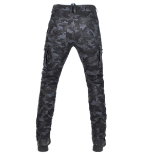 Macro detail of dark camo motorcycle cargo pants with knee pleats and utility pockets