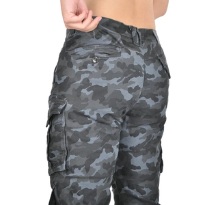 Detail of cargo motorcycle riding pants featuring camo pattern and large flap pockets