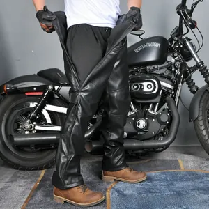 Detail view of motorcycle chaps featuring side zippers for easy quick-release removal