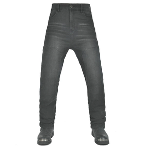 Detail of dark grey motorcycle jeans showing reinforced knee patches and denim texture