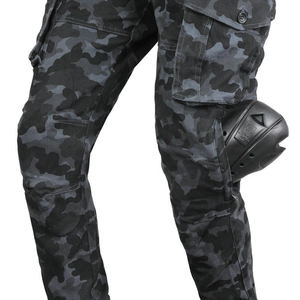 Detail of camouflage motorcycle pants featuring protective knee armor and cargo pocket