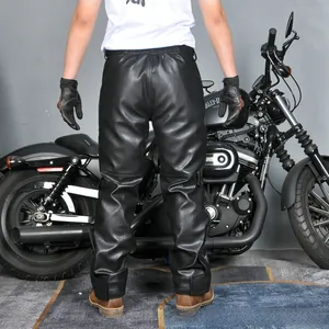 Rear view of black waterproof motorcycle leather pants with velcro ankle straps and padding