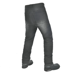 Detail of motorcycle jeans featuring flexible accordion stretch panels and durable denim