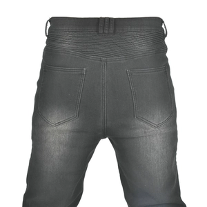 Detail of accordion stretch panels on back waist of dark grey motorcycle jeans