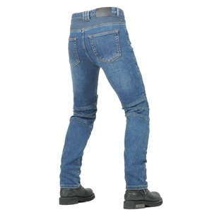 Detail view of denim motorcycle pants with accordion stretch panels at the waist and knees