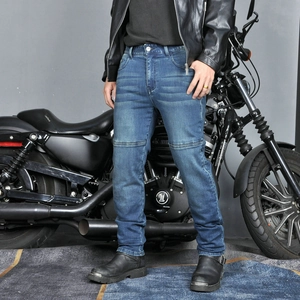 Detail of accordion pleated knee panels on blue motorcycle riding jeans for mobility