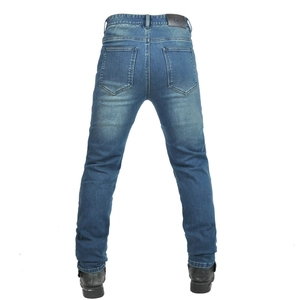 Detail view of motorcycle jeans featuring heavy stitching and black leather back patch