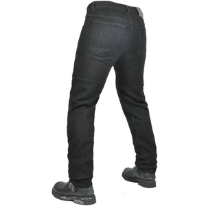 Rear view of heavy denim motorcycle jeans featuring back pockets and leather waist patch