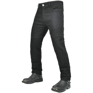 Detail of motorcycle denim pants showing reinforced knee padding and durable stitching