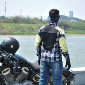 Macro detail of motorcycle riding shirt featuring back armor and Kevlar reinforced elbows
