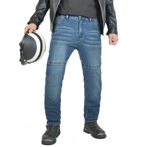 Close-up of motorcycle jeans with protective knee pleats and reinforced denim fabric