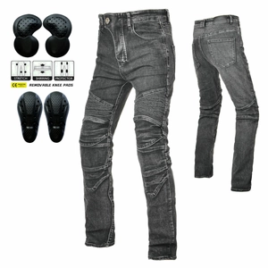 Detail of motorcycle jeans with protective pads and stretch shirring panels