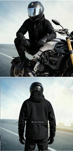 Detail of waterproof motorcycle jacket with hood and Winx Wheels logo in outdoor setting