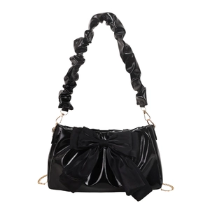 Fashionable black faux leather shoulder bag with large bow detail and ruched strap