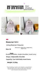 Guida alle dimensioni dello zaino in nylon rosa con stampa a gatto e dettagli tecnici