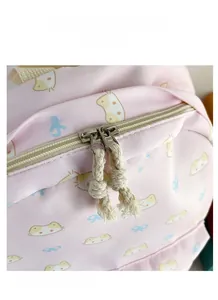 Dettaglio dello zaino rosa con gatto con doppie cerniere metalliche e tiranti intrecciati
