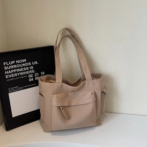 Grande borsa tote minimalista in tela beige da donna per pendolari con tasche multiple