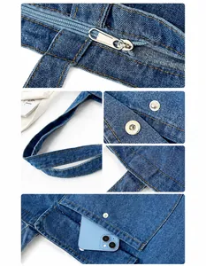 Detailansicht der Denim-Tasche mit Metallreißverschluss, Magnetverschluss und Fronttasche