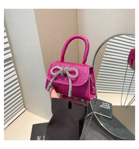 Mini rose red sequin crossbody bag with rhinestone bow and silver chain strap