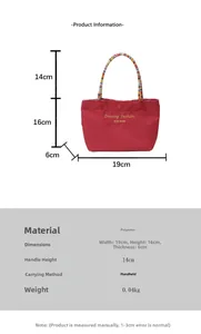 Detailed size specifications for the red canvas handbag with woven handle and dimensions