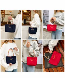 Detailed views of small canvas bags with colorful beaded handles and magnetic closure