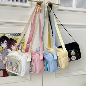 Five colors of ITA bags with cat ear designs and clear windows for display in one frame