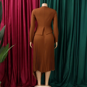 Detail of caramel brown long sleeve dress with pleated skirt and back zipper