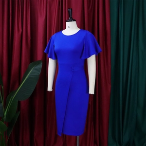 Macro view of royal blue dress showing ruffled sleeves and decorative waist buttons