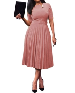 Detail of elegant pleated mauve dress featuring short sleeves and a matching square buckle belt