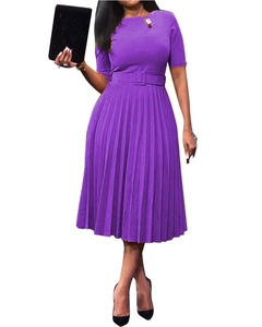 Detail of purple pleated dress featuring round neck short sleeves and matching belt