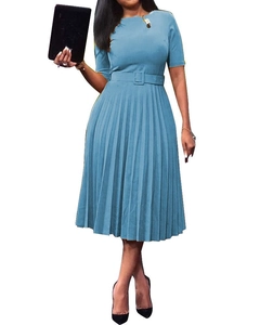 Detail of light blue short sleeve pleated dress with a matching belt and a crew neck design