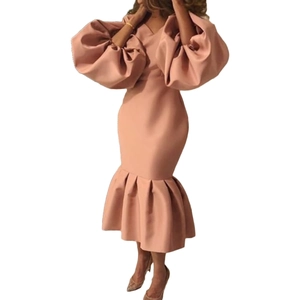 Detail of elegant V-neck midi dress featuring dramatic puff sleeves and ruffled mermaid hem